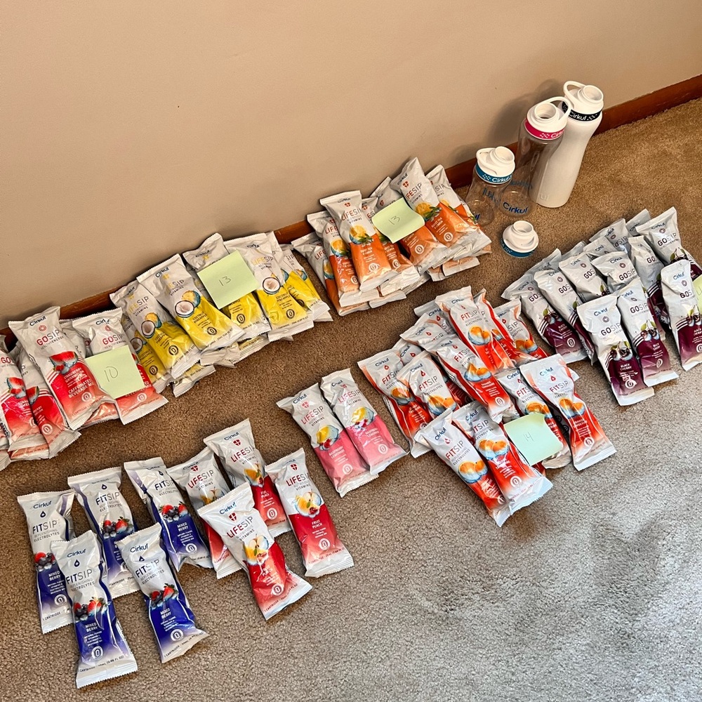 1 extra Cirkul Top, 75 sips - Expired in 2021, 3 various Cirkul Water Bottles